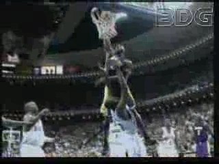 Kobe Bryant Dunks Dwight Howard