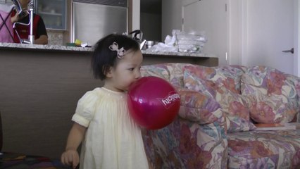 Girl Shaking Balloon