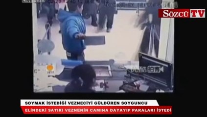 Soymak istediği vezneciyi güldüren soyguncu