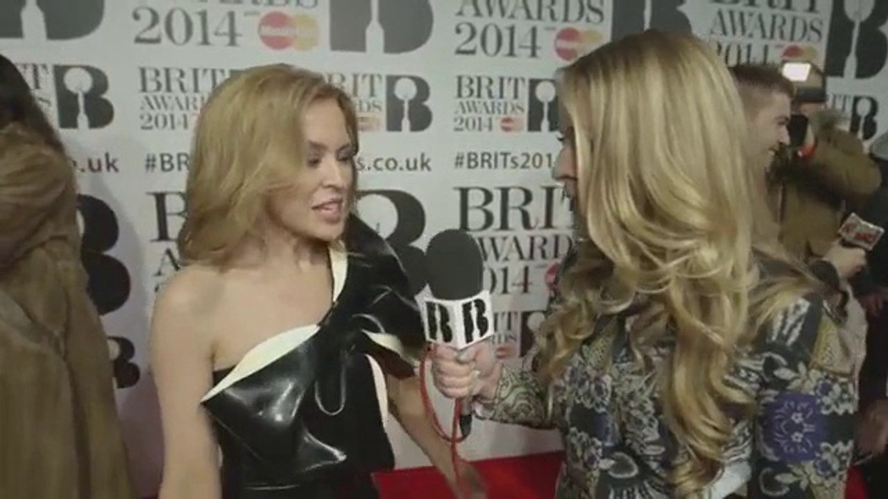 Kylie Minogue - short interview at red carpet  BRITs 2014