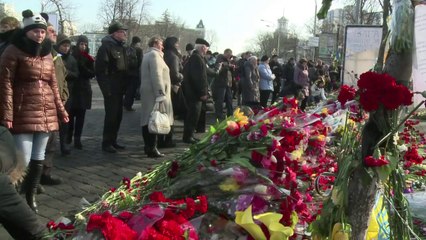 Ukraine to unveil unity cabinet, disband riot police