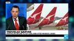 BUSINESS DAILY - Qantas slashes more jobs as losses mount