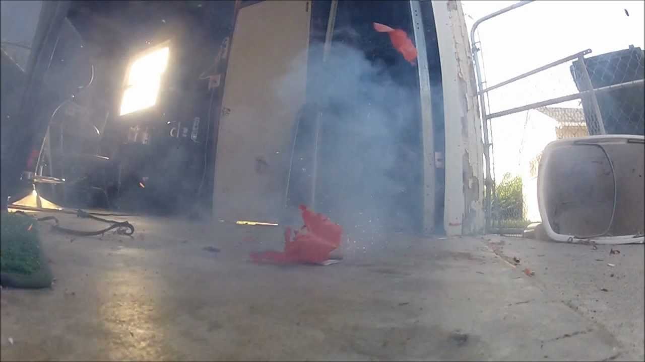 Brick of fire crackers blowing up in slow motion HD (Go Pro Hero 2)