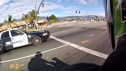 Police officer caught speeding while talking on his cell phone