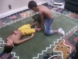 Wracling ,Two boys  doing fight about....