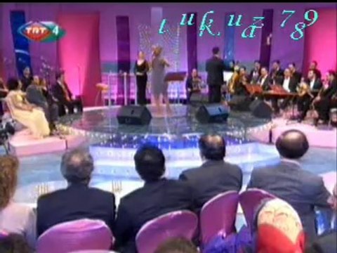 Meral MANSUROĞLU-Bir Kızıl Goncaya Benzer Dudağın