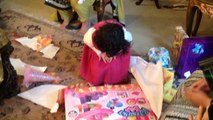 Ansa opening her gifts