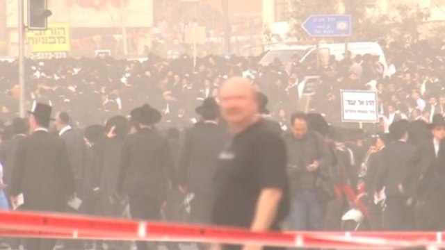 Ultra-Orthodox Jews protest at the entrance to Jerusalem