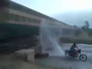 Funny Motorbike vs Train in Pakistan