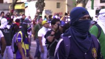 Venezuelan protesters clash with riot police in Caracas