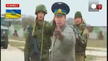 Tensions persist in Crimea as Ukrainian troops challenge Russians