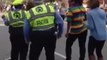Policeman Dances The Wobble At Mardi Gras