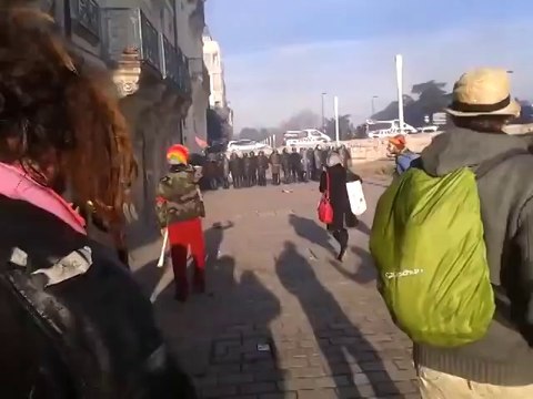 French cops hit an old woman during riots! Violent...