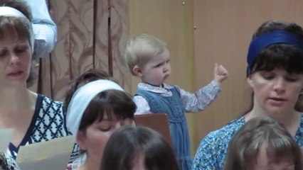 Little Girl Conducting a Church Choir in Kyrgyzstan