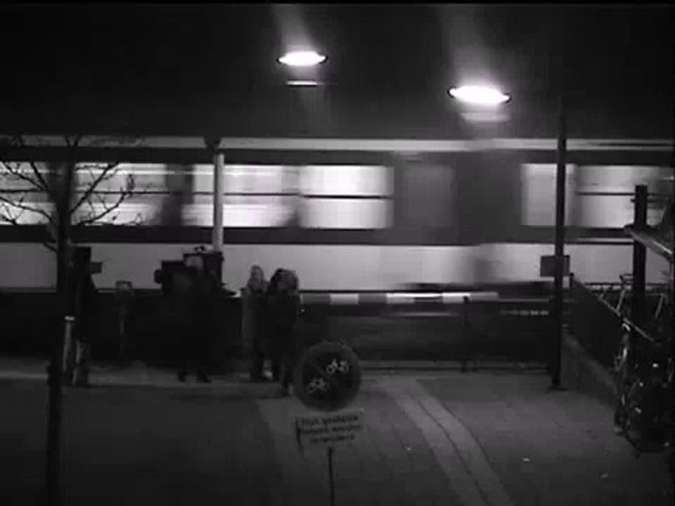 Extremely close call for railroad crosser