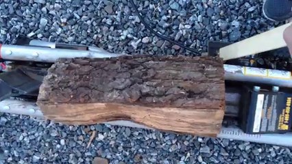 Cutting up logs for the winter is easy with this machine. - Ron Robey
