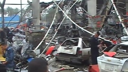 Officials: Suicide bomber kills at least 32 in Iraq