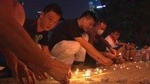 Candlelight vigil held for passengers of missing Malaysian jet