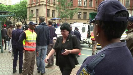 Oscar Pistorius supporter attends S. Africa murder trial