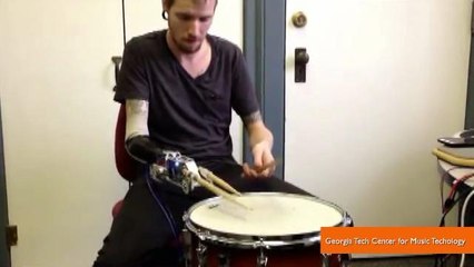 Robotic Arm Transforms Amputee into Three-Armed Drumming Wonder
