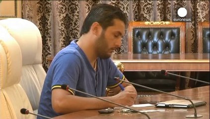 Libya dismiss PM as rebel held oil tanker breaks naval blockade