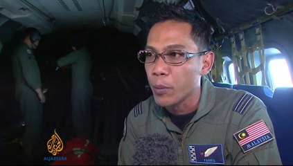 malaysia-widens-search-area-missinglane-201431210448462225.html-2014-03-13-02-20-26
