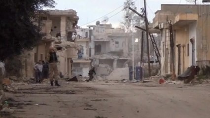 Gunfire in Syrian town, as civil war moves into fourth year