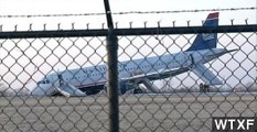 U.S. Airways Jet Crashes On Runway After Tire Blows Out