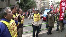 Fukushima nuclear workers rally against plant operator