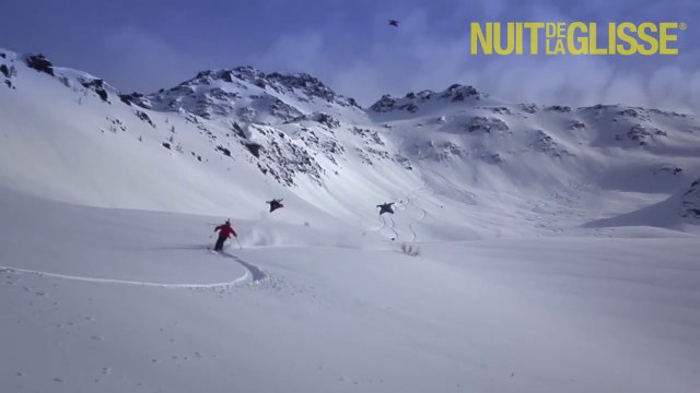 Crazy guy with a Wingsuit flying above skiers! Insane!
