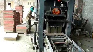 Automatic hollow blocks making machine