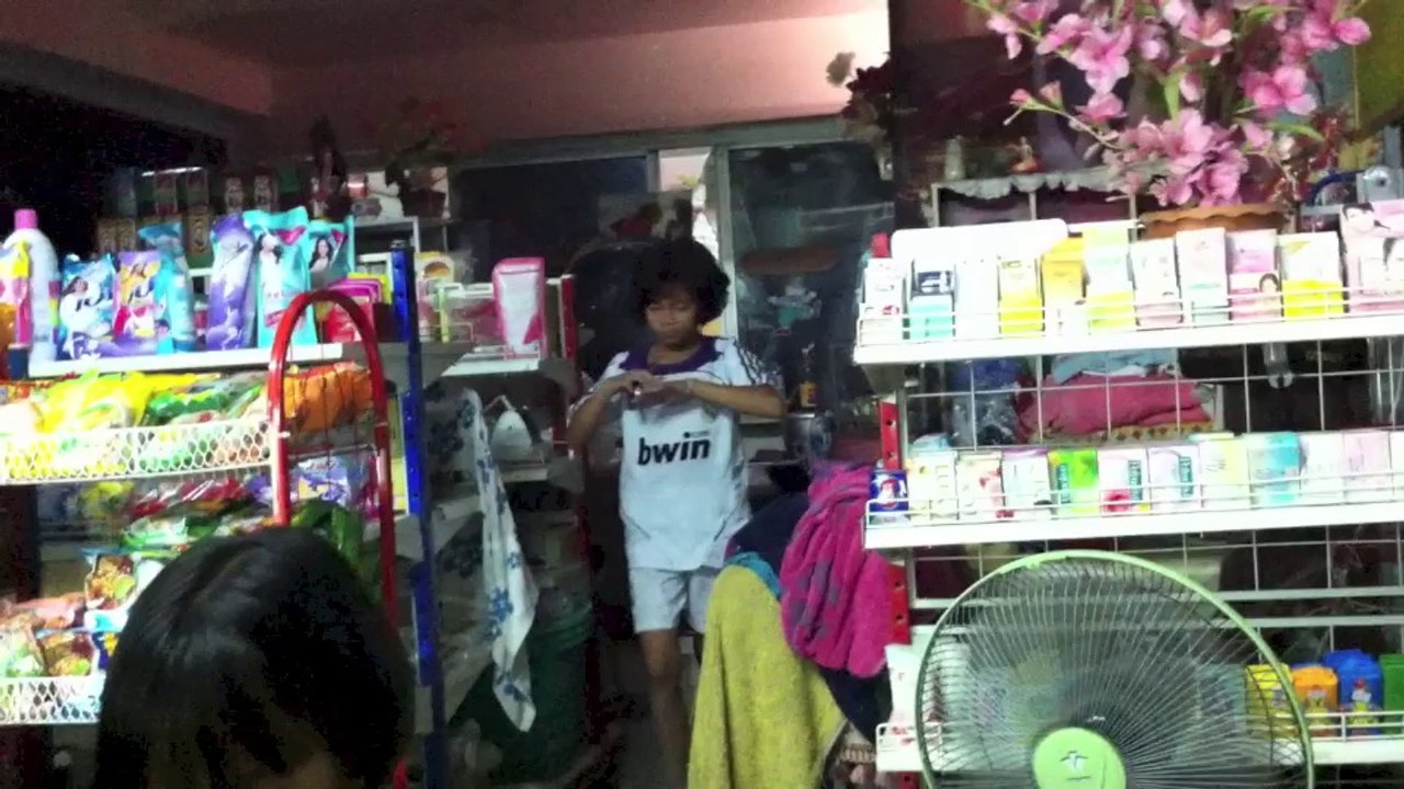 one week thai baby watching iPad