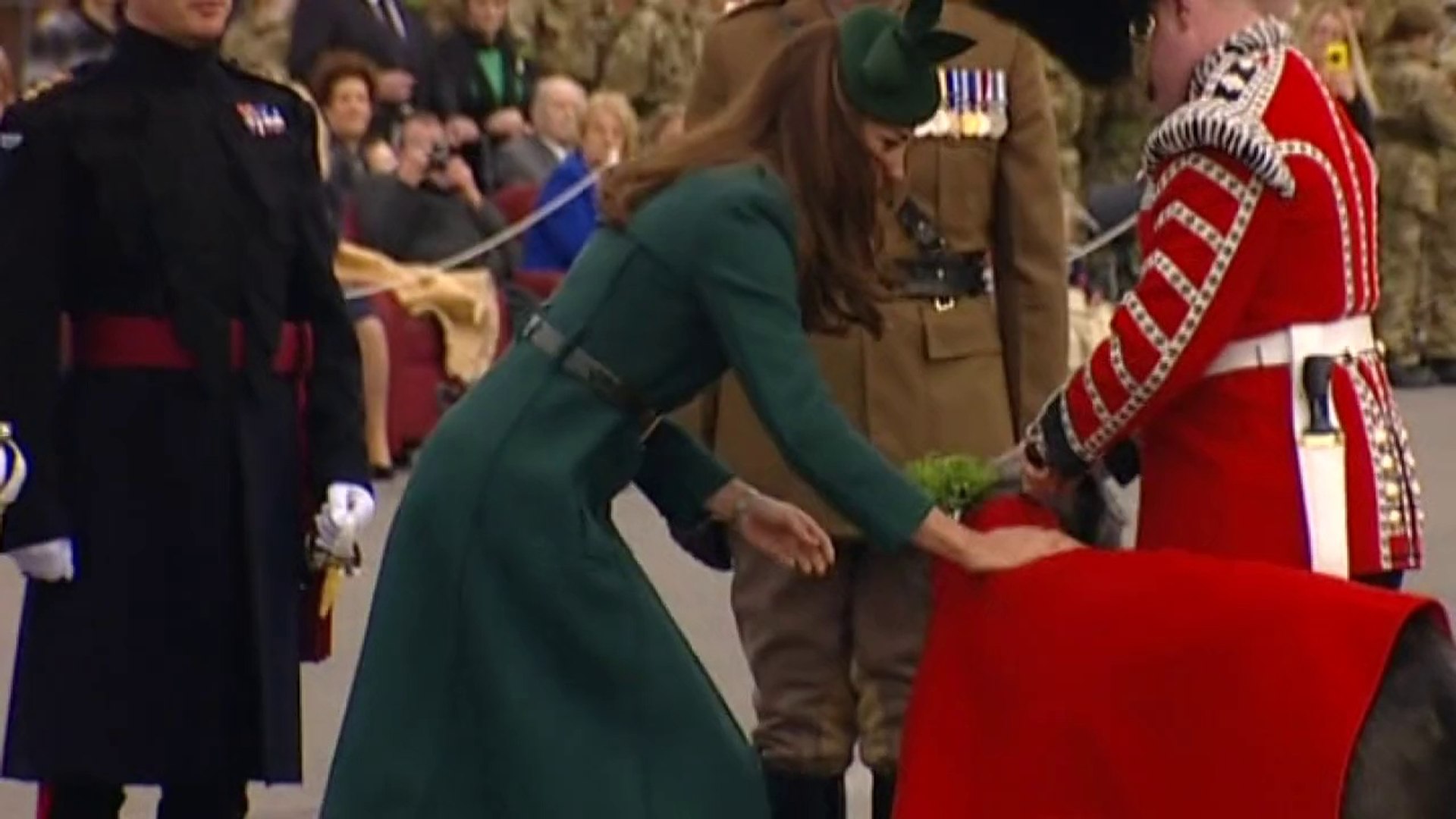 ⁣Kate presents shamrocks to troops to mark St Patrick's Day