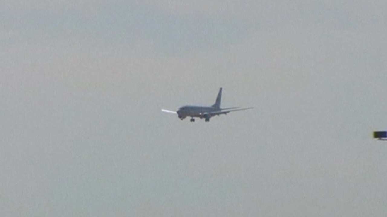 Australia says satellites spot objects possibly from Malaysian plane