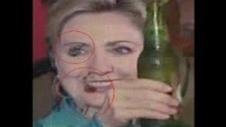 More Reptilian clips  Hillary Clinton shapeshifting in bar[240P]