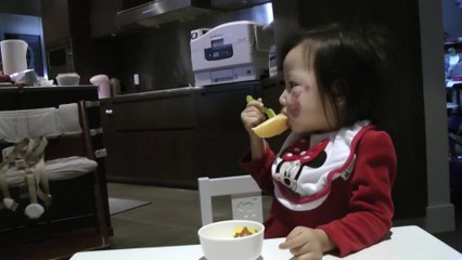 Girl Eating Orange