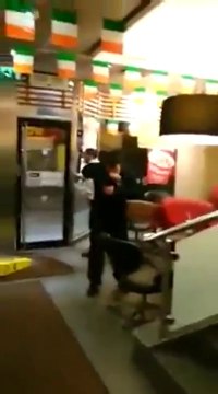 Violent fight in McDonald's restaurant with tear gas! Doors are broken!