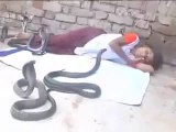 Ten year Indian girls talking playing eating wit snake must watch.