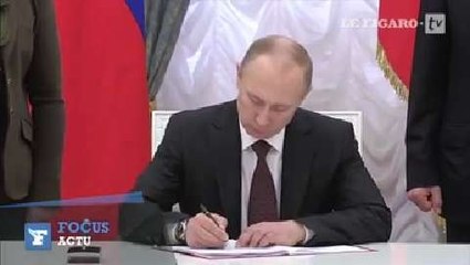 Vladimir Poutine signe le traité rattachant la Crimée à la Russie