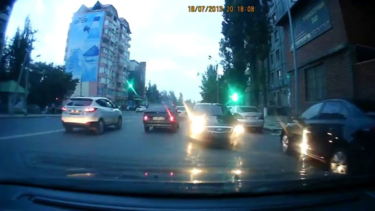 Crazy Driver Speeds Down Road In Reverse