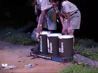 Playful Otter Refuses to Recycle!