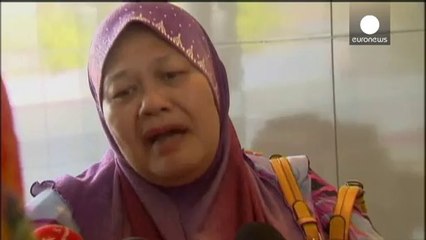 Families of passengers on missing flight MH370 in despair