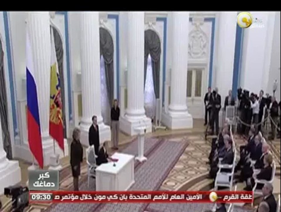 كبّر دماغك: توقيع الرئيس الروسي بوتين على ضم جزيرة القرم لروسيا