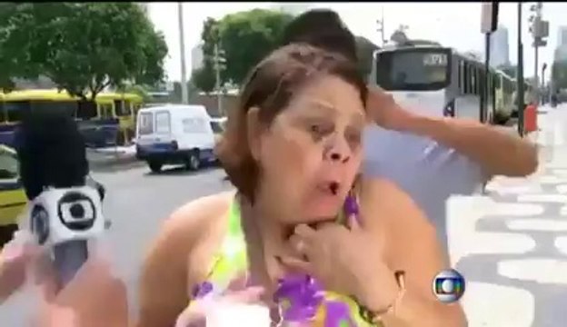 Guy stealing a woman during tv interview... On Brazilian TV!