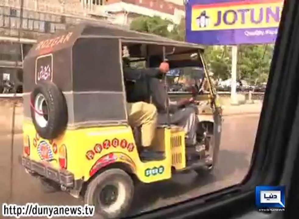Police taking the accused in auto rickshaw after court appearance