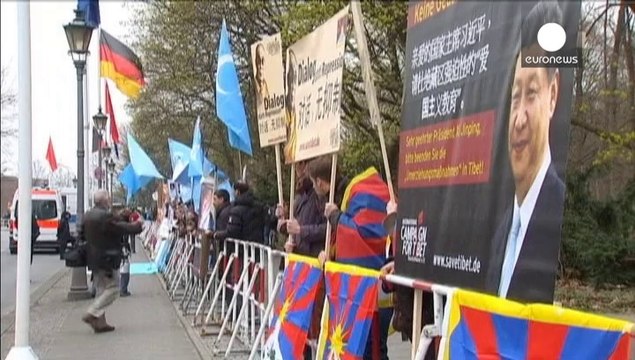 Merkel warns China's Xi Jinping over free expression