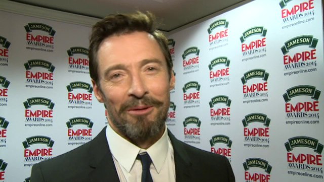 Hugh Jackman impersonates Arnold Schwarzenegger