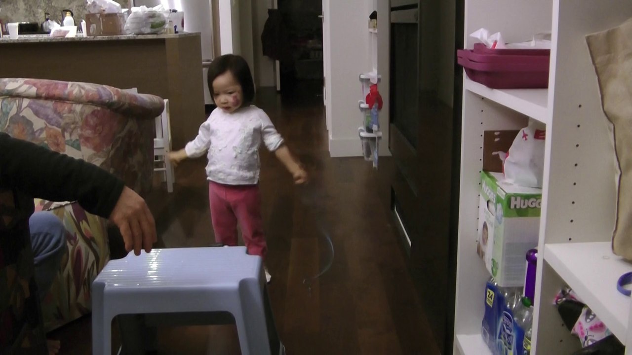 Girl Playing Shoelaces