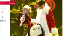 SpinMedia - Miley Cyrus Debuts A New Haircut and Gets All Freaky with Santa Claus at Jingle Ball