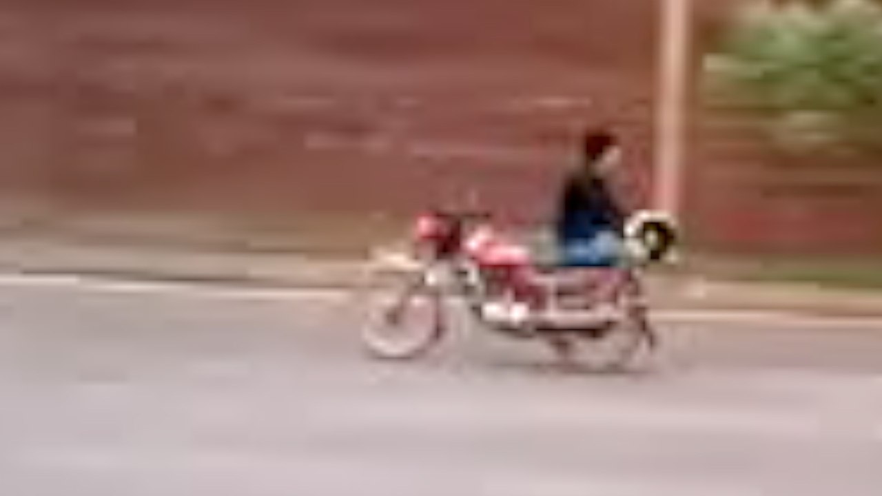 Police Seek Impossible Backwards Motorcyclist